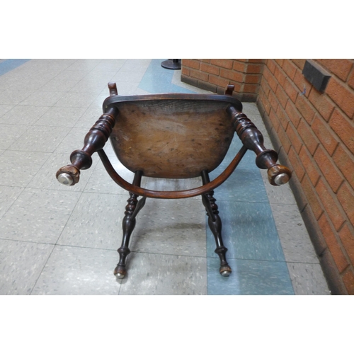 1 - A 19th Century elm and yew Windsor chair, attributed to Gabbitas workshop, Worksop