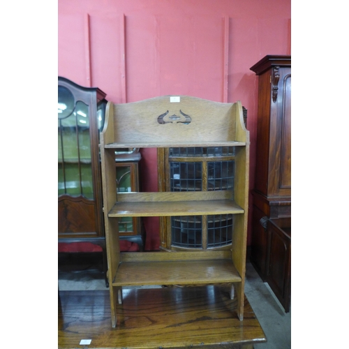 12 - A small Arts and Crafts oak open bookcase