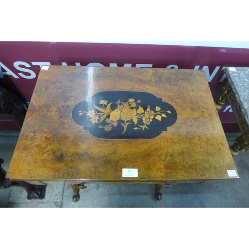 18 - A Victorian inlaid walnut games table