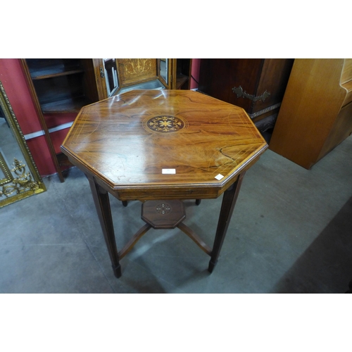 28 - An Edward VII marquetry inlaid rosewood octagonal centre table