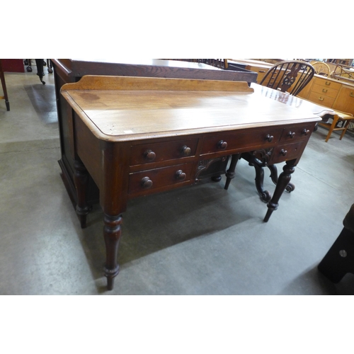 38 - A Victorian mahogany writing table
