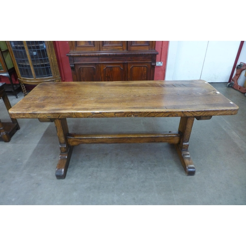 4 - An elm refectory table, 76cms h, 190cms l, 71cms w
