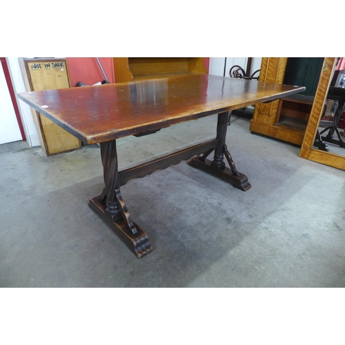 5 - An early 20th Century oak refectory table, 76cms h, 152cms l, 90cms w