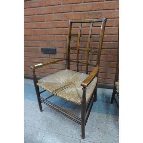 6 - A Liberty & Co., Arts and Crafts beech lattice back fireside chair and one other