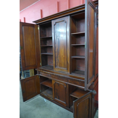 7 - A Victorian mahogany six door housekeeper's cupboard, 213cms w, 157cms w, 46cms d