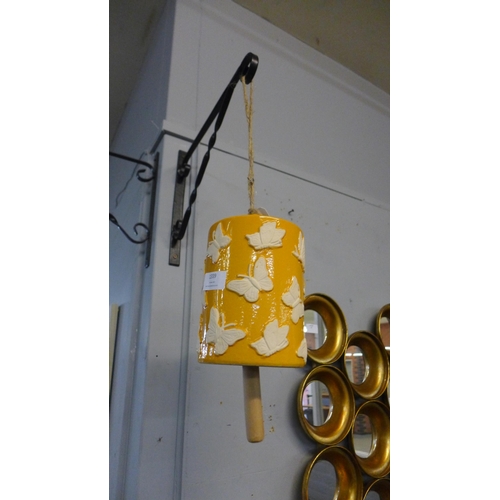 1349 - A yellow ceramic windchime decorated with a butterfly print (7GD22006)   *