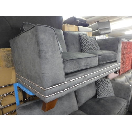 1370 - A  charcoal velvet and studded four seater sofa and three seater sofa (original RRP £3558)