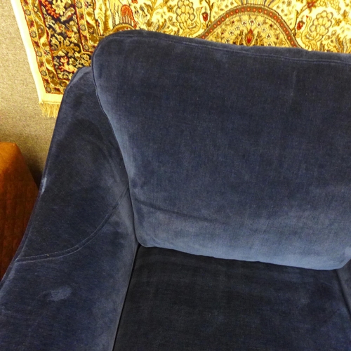 1468 - A deep ocean blue velvet oversized armchair with washed oak legs