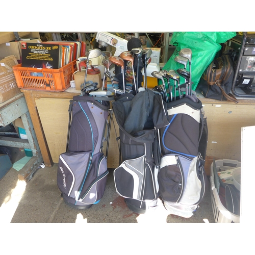 2048 - 3 golf bags with clubs including Taylor made, Wilson and Fazer