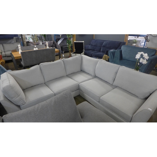 1453 - A dove grey fabric corner sofa - different arm ends