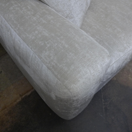 1302 - An Ivory velvet corner sofa and love seat