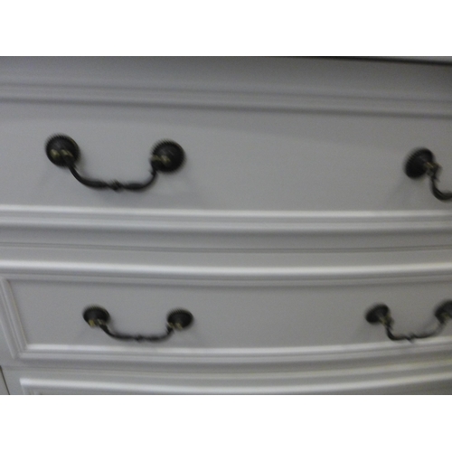 1304 - A white three drawer chest
