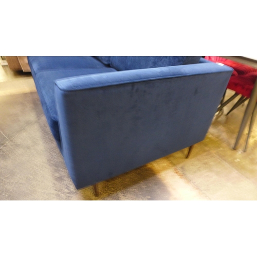 1347 - A blue velvet three seater sofa