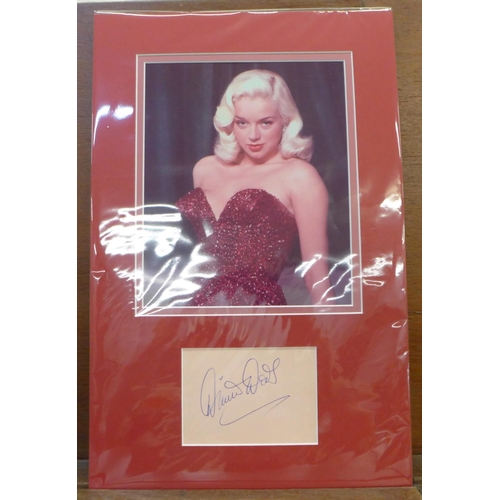 620 - A Diana Dors autograph display, mounted picture and autograph