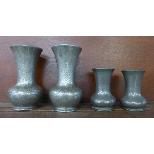 632 - Two pairs of pewter vases, the larger pair marked Tudric, 17.5cm