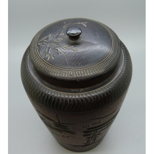 637 - A Japanese wooden tea caddy, 18cm
