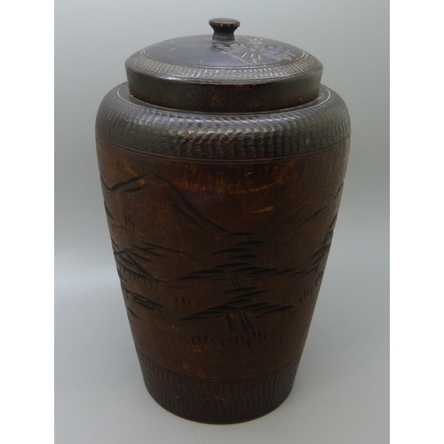 637 - A Japanese wooden tea caddy, 18cm