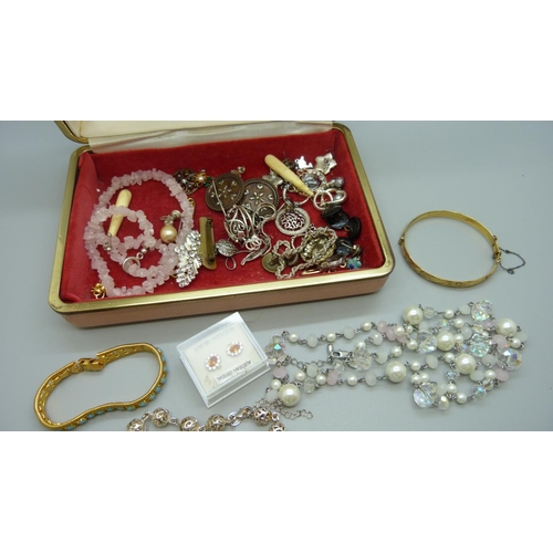 641 - A box of costume jewellery including silver earrings, chain, ring, etc.