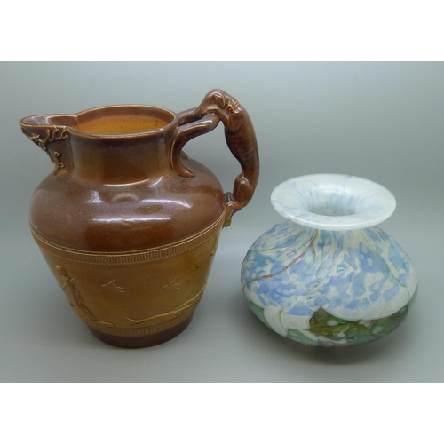 645 - A Doulton Lambeth salt glaze relief hunting jug and an Isle of Wight glass vase