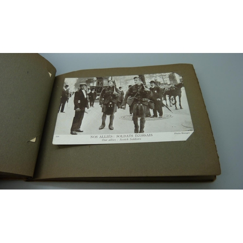 652 - A small album of postcards, La Guerre par la Carte Postale