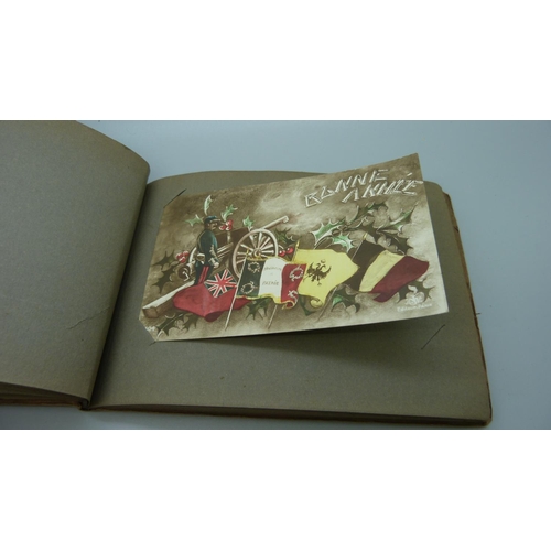 652 - A small album of postcards, La Guerre par la Carte Postale
