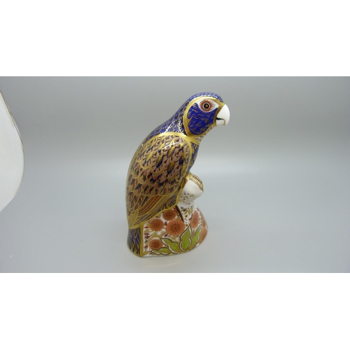655 - A Royal Crown Derby paperweight, Bronze Winged Parrot, 18cm, gold stopper and red Royal Crown Derby ... 