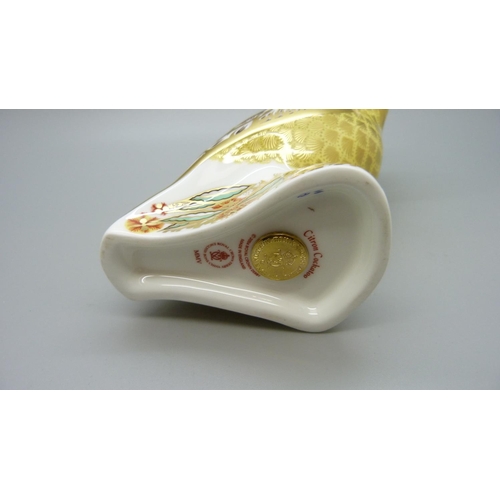656 - A Royal Crown Derby Bird Paperweight, Citron Cockatoo, 13cm, gold stopper and red Royal Crown Derby ... 