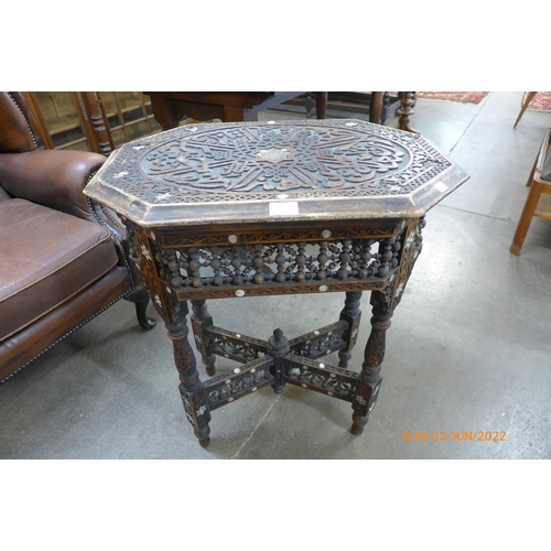 17 - A late 19th/early 20th Century Moorish carved hardwood and mother of pearl inlaid octagonal occasion... 
