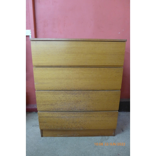 39 - A teak chest of drawers
