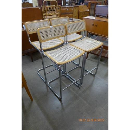 47 - A set of four Marcel Breuer style chrome, beech and rattan stools