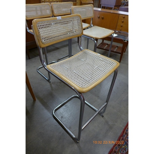 47 - A set of four Marcel Breuer style chrome, beech and rattan stools