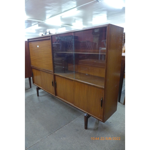 60 - A Beaver & Tapley teak writing cabinet/bookcase