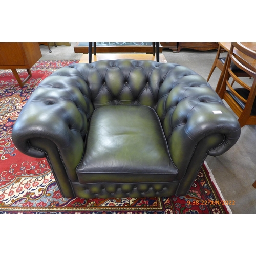 7 - A green leather Chesterfield club chair