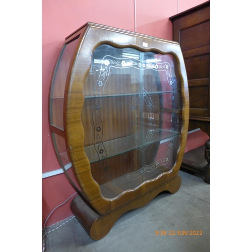 8 - An Art Deco walnut display cabinet