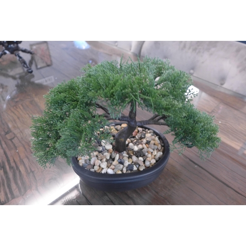 1328 - A small artificial Bonsai tree in black ceramic planter
