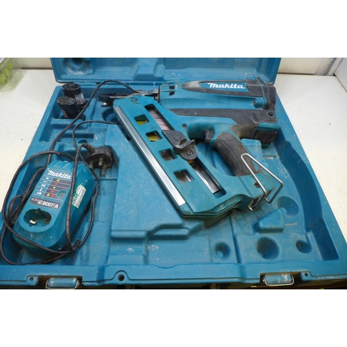 2023 - Makita GN900 cordless nail gun with 2 batteries & charger in case - W