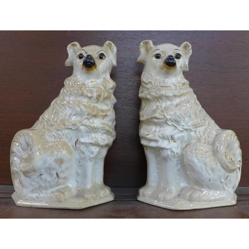 601 - A pair of late 19th Century/early 20th Century Staffordshire Spaniels, 32cm