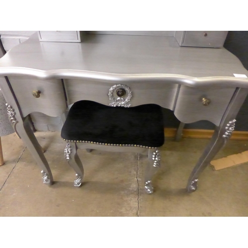 1423 - A silver dressing table with mirror and upholstered stool