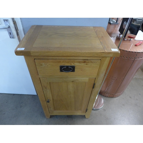 1309 - An oak tall one drawer telephone stand