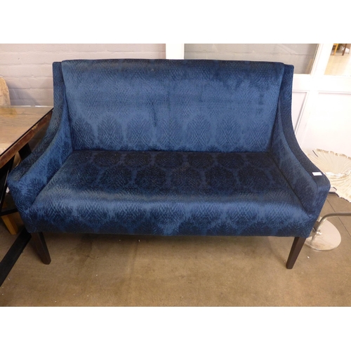 1337 - A blue patterned velvet three seater sofa/bench