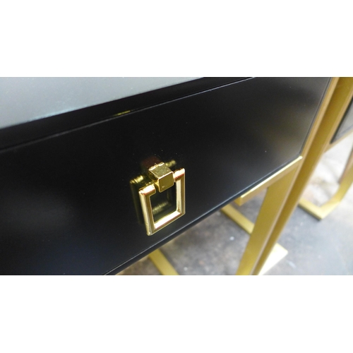 1513 - A pair of black bedsides with gold legs