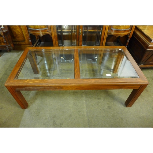 51 - A G-Plan teak and glass topped coffee table