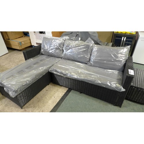 3054 - 3-piece Black rattan corner sofa set with grey cushions and glass topped coffee table * This lot is ... 