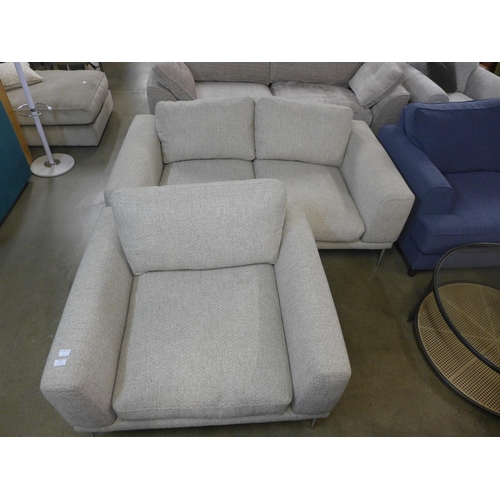1304 - A champagne textured weave oversized armchair and two seater sofa, both on chrome legs