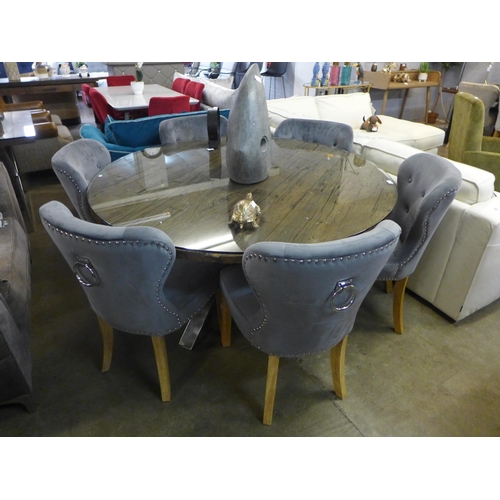 1305 - A Chennai large circular dining table and a set of six Arlo grey chairs
