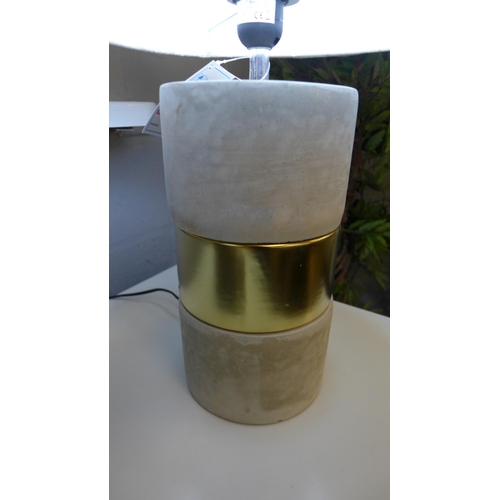1328 - A concrete base table lamp with a decorative gold band and linen shade, H 63cms (70316743)   #