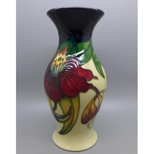605 - A Moorcroft Pottery vase decorated in the Anna Lily pattern, designed by Nicola Slaney, shape 226/9,... 
