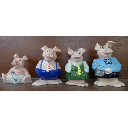 613 - Four Nat West pig money banks; Mum, Brother, Sister and Baby