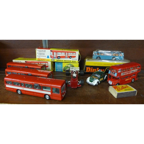 617 - Five Dinky model buses, three boxed, a Corgi  VW Police car, boxed and a Dinky racing car