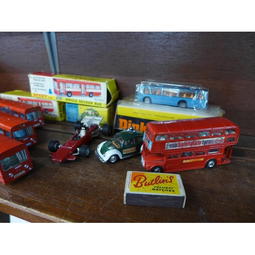 617 - Five Dinky model buses, three boxed, a Corgi  VW Police car, boxed and a Dinky racing car